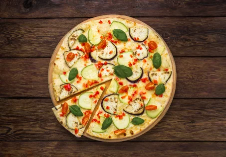 Recette de la pizza mozzarella, tomates et courgettes