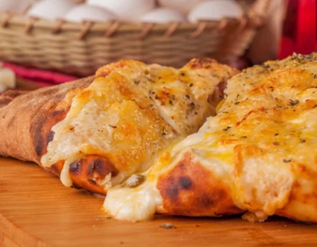 Recette de pizza calzone et oeuf coulant