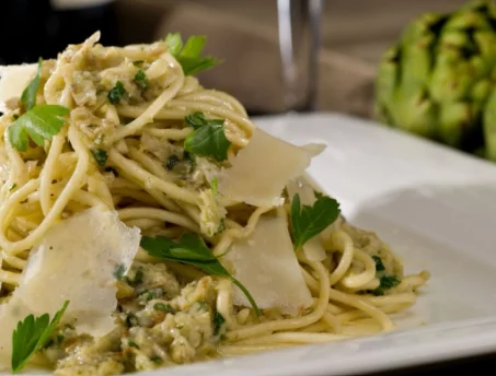 Recette de pâtes aux artichauts et pesto de roquette